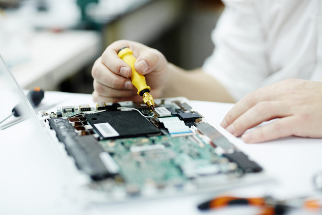 Man Working on Electronics